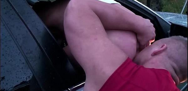  A girl stuck her ass through a car window for any guy to fuck in public sex orgy